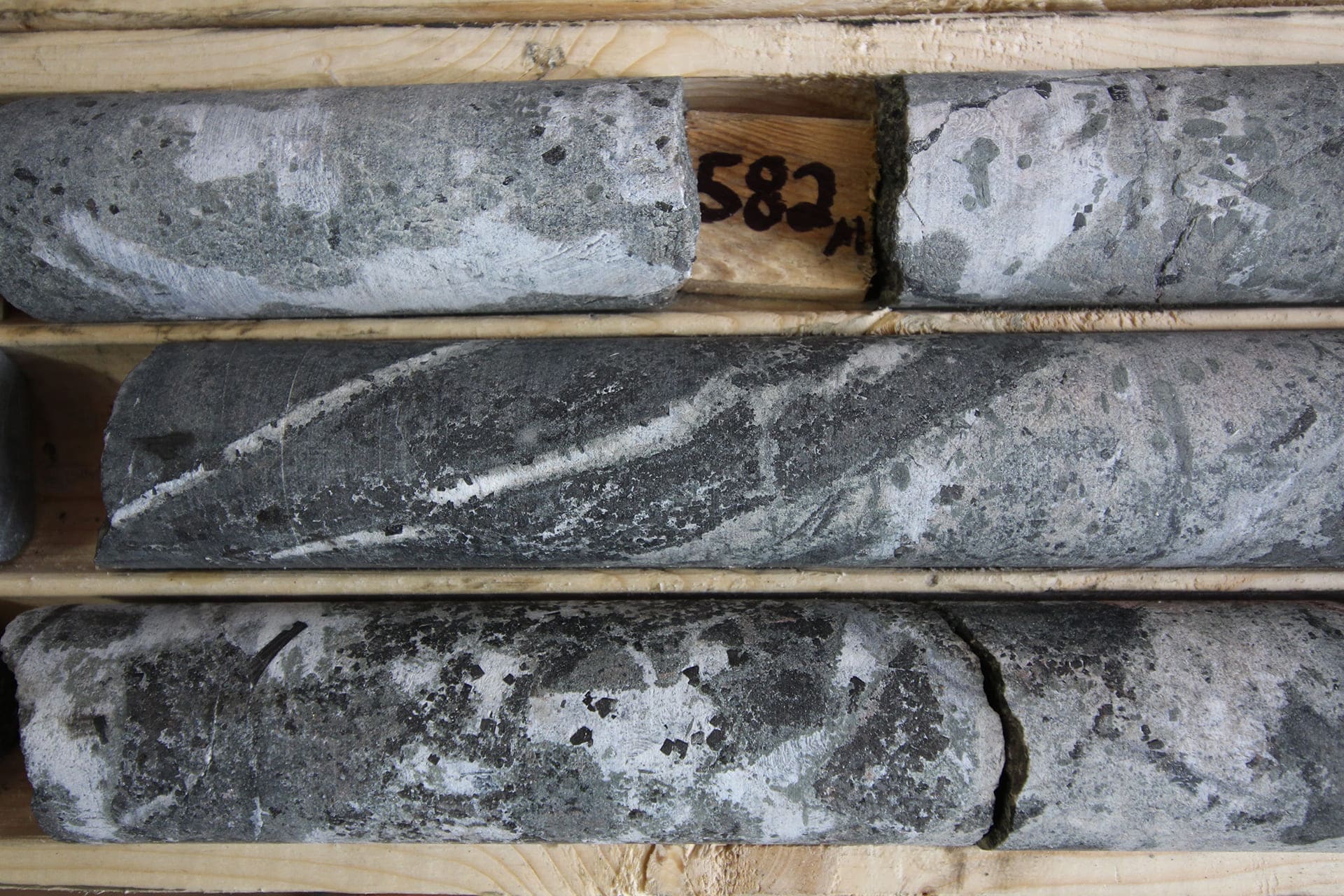 High Density REE mineralization at 582m in Hydrothermal Breccia in Hole 002