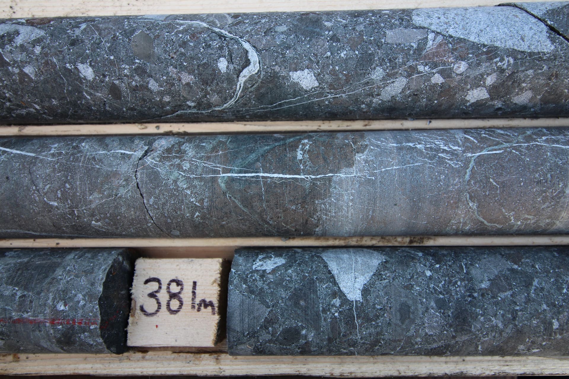 Hydrothermal breccia, fluorite and high temperature veins in drill core, Oct. 2020